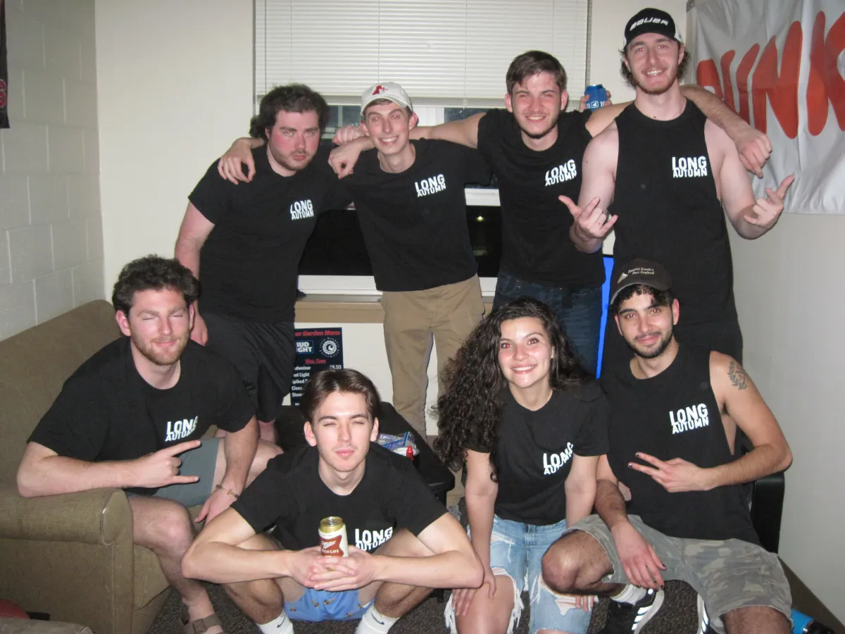 Fan wearing Long Autumn tee